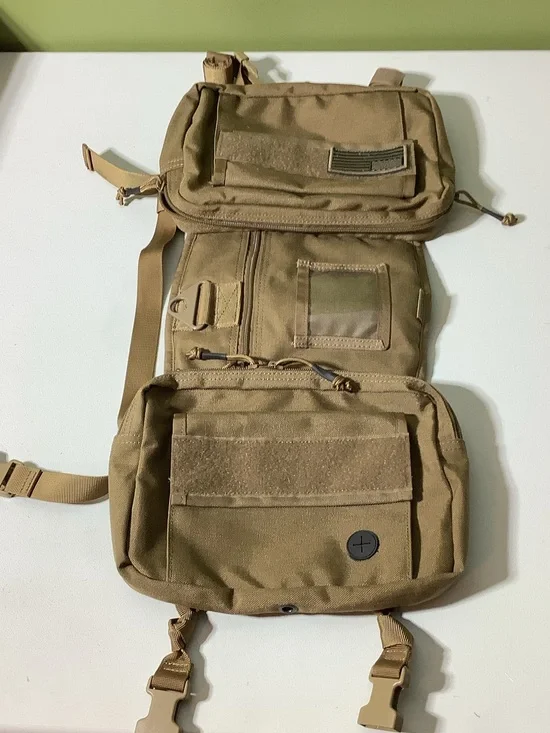 One Tigris khaki tactical pack for dogs