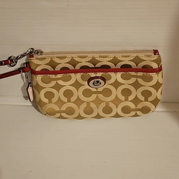 New Coach cream and pink wristlet