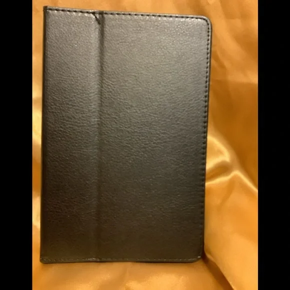 Black tablet cover, Magnetic closure, Measures @ 7 1/2” x 5”, NWT