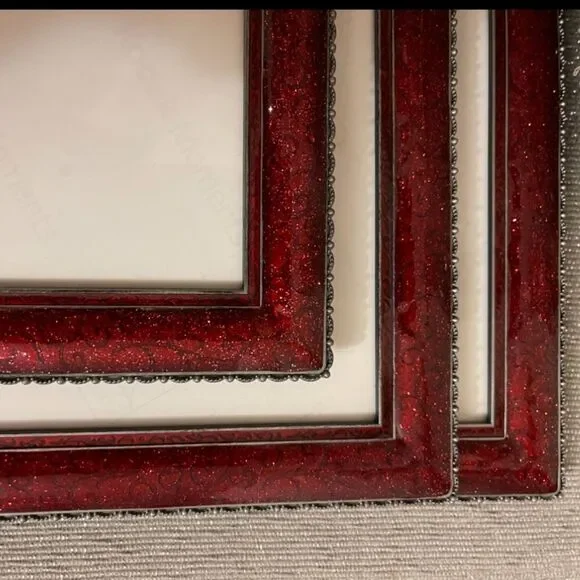 Three burgundy frames