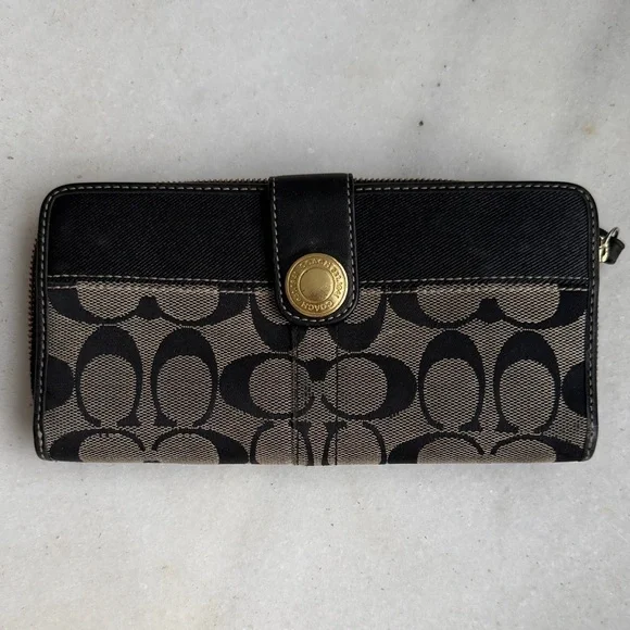 Coach Legacy Signature C jacquard and leather wallet.