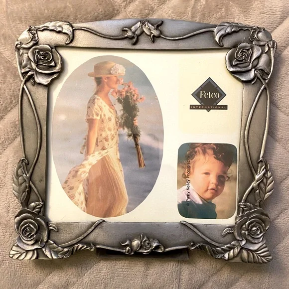 Fetco International Silver Floral Photo Frame stand is tight.  OSP