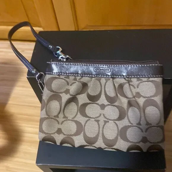 Coach canvas logo wristlet