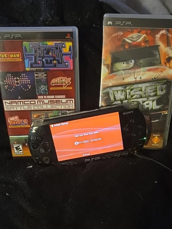 Sony PSP Slim Portable Gaming Console in Black with 2 Games