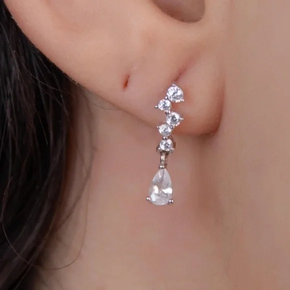 Zara 925 sterling silver dangle earrings with pear sharped CZ