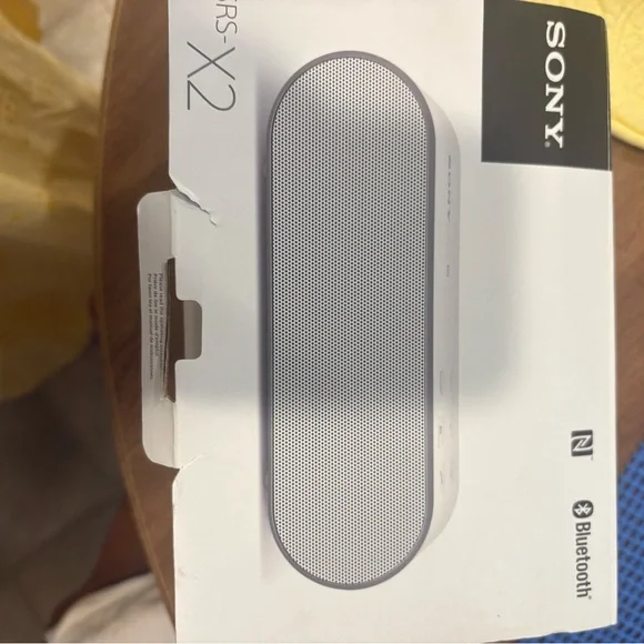 Sony Portable Bluetooth Speaker in white and silver