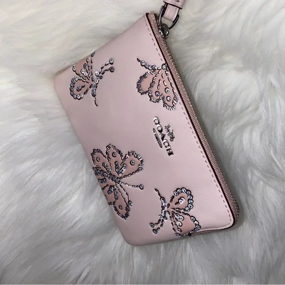 Coach leather wristlet with butterflies New
