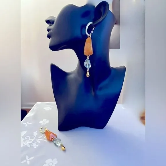 Dangle earrings with 3” drop from ear.