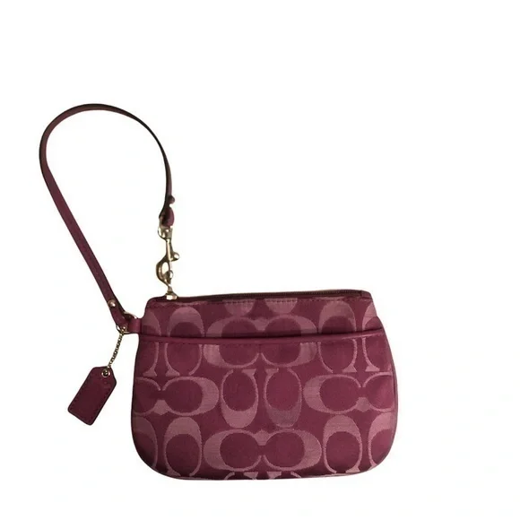 Coach purple signature c wristlet bag