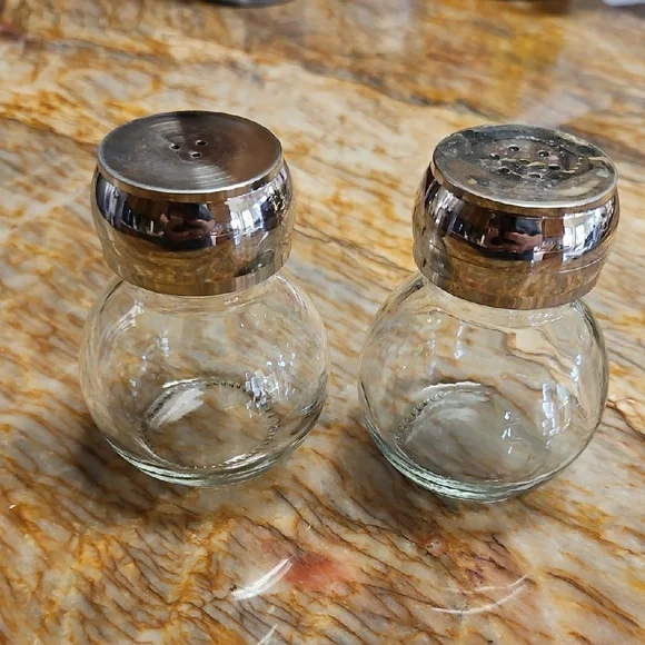 Clear Glass Salt and Pepper Shakers with Silver Tops