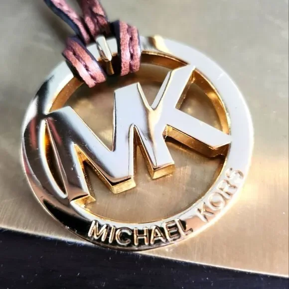 Michael Kors Gold Logo Pendant with Brown Cord