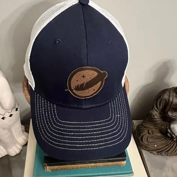 NWOT Blue Origin Feather Trucker SnapBack hat.