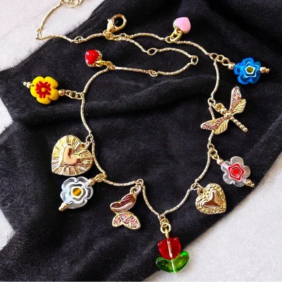 Gold and Red toned Charm Necklace glass rhinestones enamel tulip flower hearts