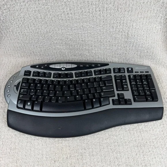 Microsoft Wireless Comfort Keyboard 4000 Ergonomic USB Model 1045 Silver Black‎