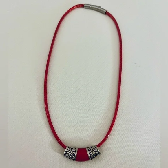 Sterling silver & leather chord necklace with Celtic pendant
