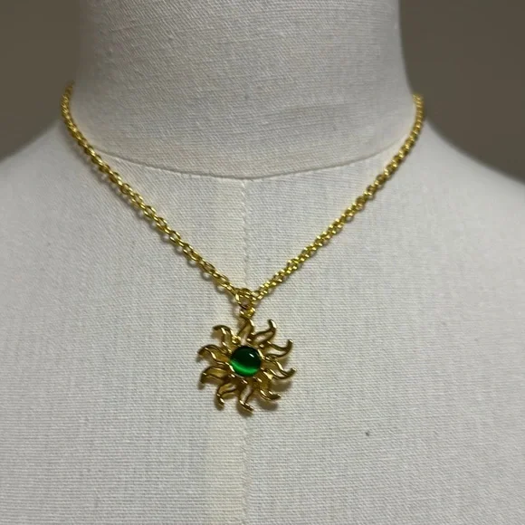 Gold Sun Pendant Necklace with Green Gem
