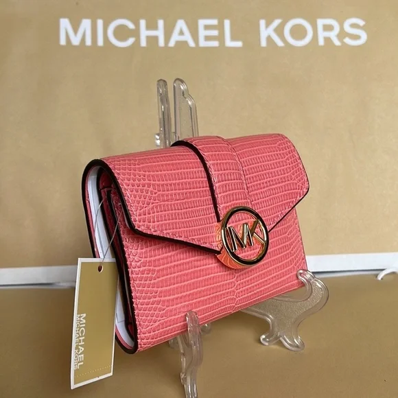 MICHAEL KORS CARMEN MEDIUM FLAP LOGO BIFOLD WALLET GRAPEFRUIT
