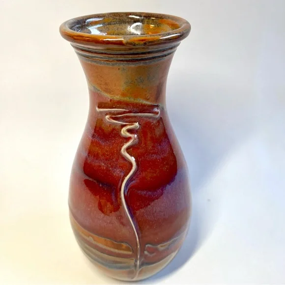 Signed Art Pottery Vase 4 feathers signature on bottom 8 In tall Sunset Colors