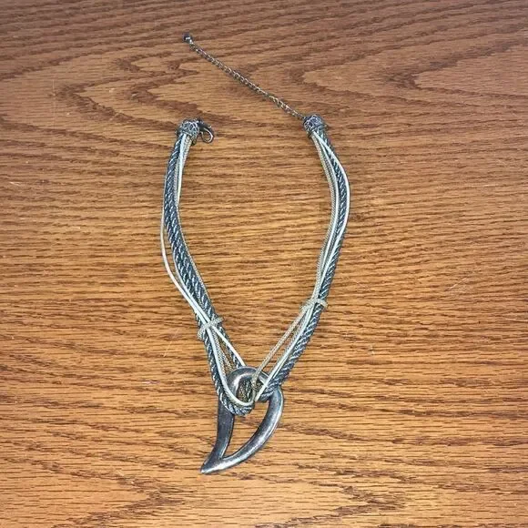 Chico’s 6-strand necklace with chunky Brooch in silver. EUC 10” long 5” extender
