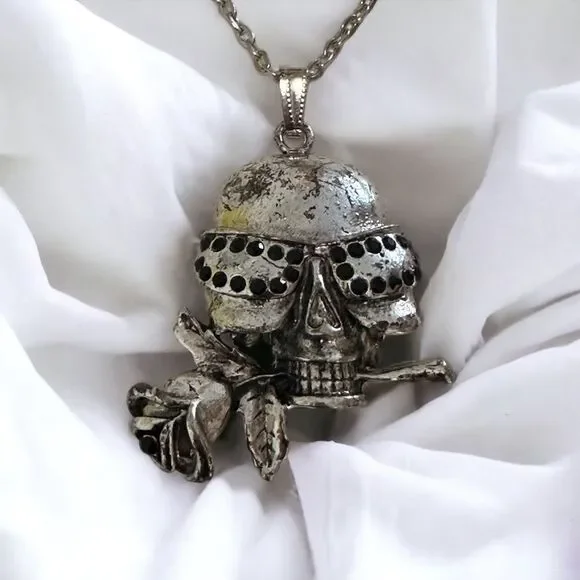 Vintage silver skull with black rhinestones and rose