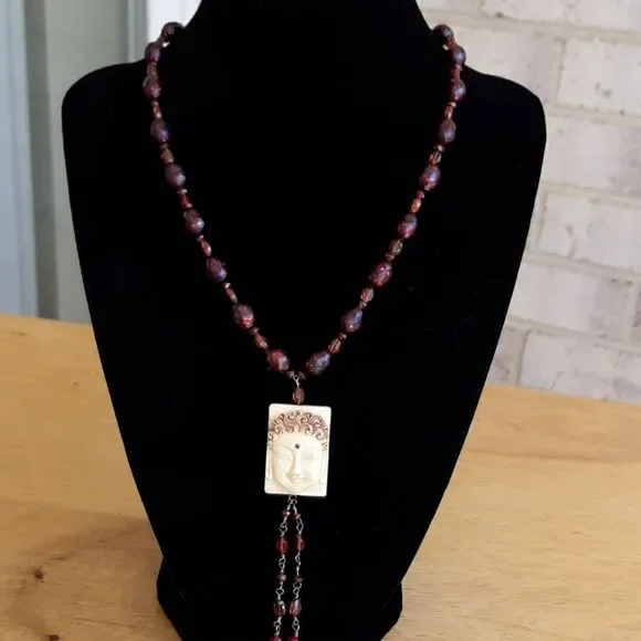 Artisan carter Wells purple beaded necklace with bone pendant