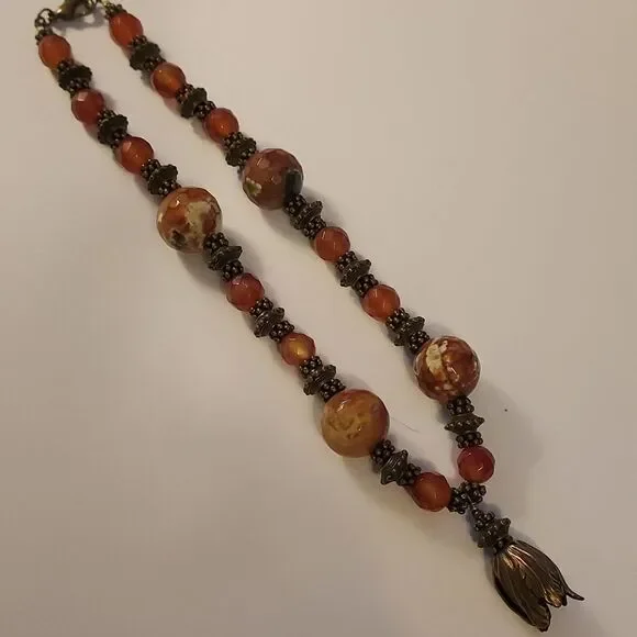 Handmade boho necklace beaded rust brown and bronze collar charm pendant