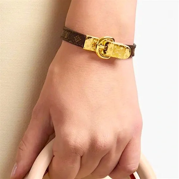 Louis Vuitton Bracelet Gold Tone and Leather monogram LV belt bracelet