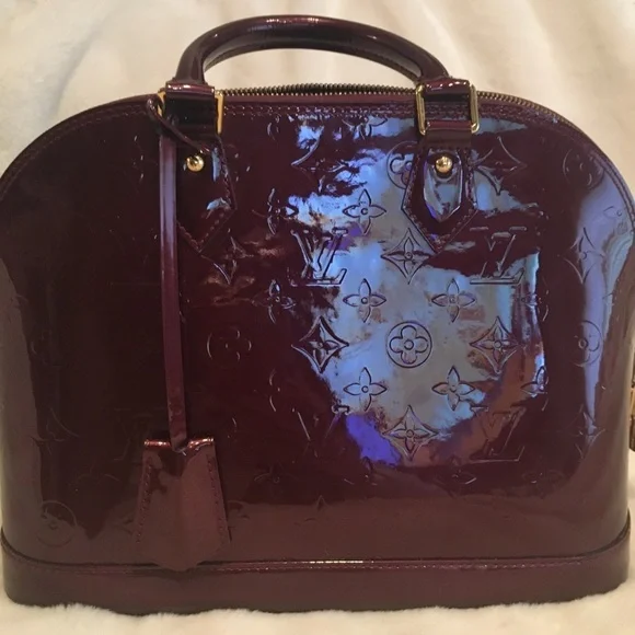 Louis Vuitton Alma pm rouge fauviste. Excellent