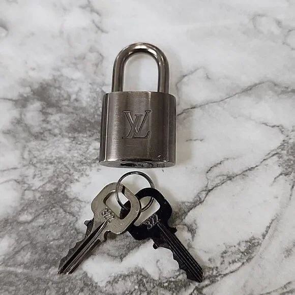 Authentic Louis Vuitton Silver Lock and Key