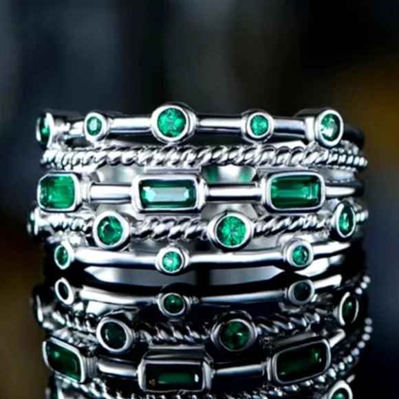 Ring with green stones