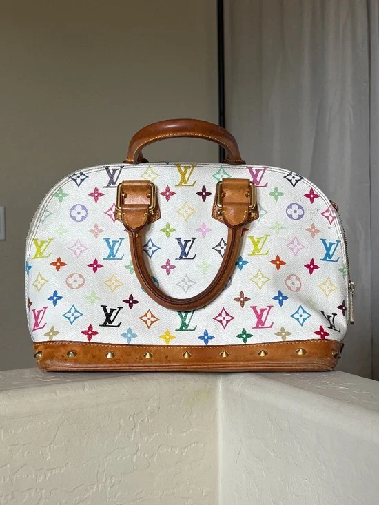 Louis Vuitton monogram alma white