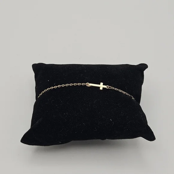 gold tone chain bracelet with cross charm