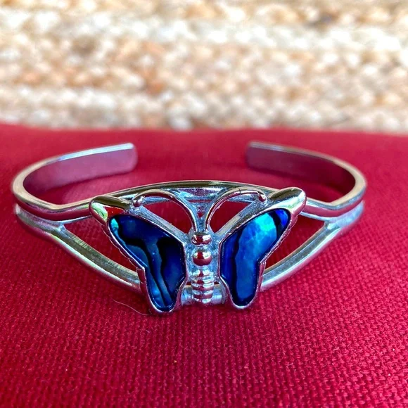 Silver tone Girls Butterfly bracelet.. adjustable-fits small wrist