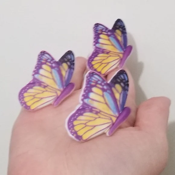 EUC butterfly plastic rings- purple, yellow, and white
