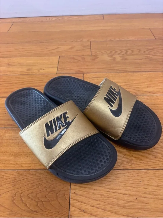 Nike Black and Gold Slide Sandals, women’s size 6
