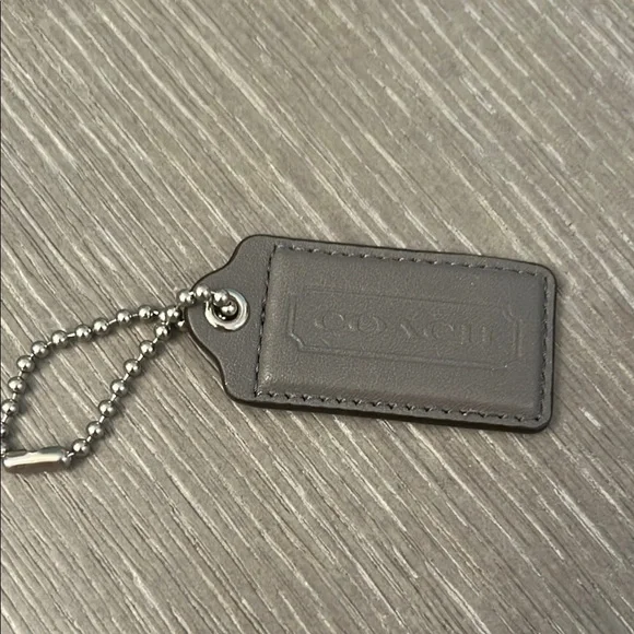 Coach Gray Leather purse tag‎
