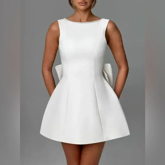 Elegant White Dress with Pearl Accents