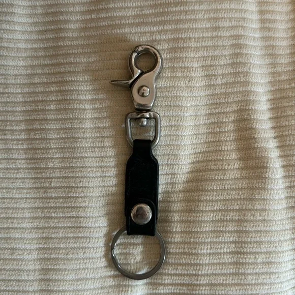 Vintage Coach Black Leather and Nickel 5 Inch Key Chain. Used. “Coach” worn off.