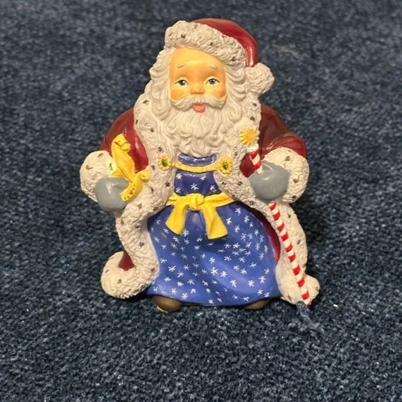 Small Santa with stars on his robe by Lenox’s Collectors Treasury of Santa’s.