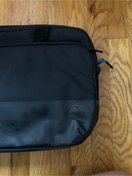 Dell Black Laptop Sleeve Bag, shoulder strap, and Amazon mouse
