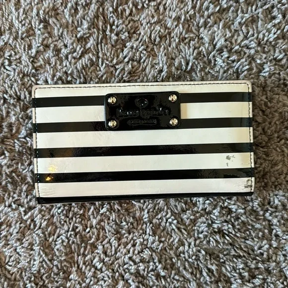 Striped black and white, shiny Kate Spade card wallet