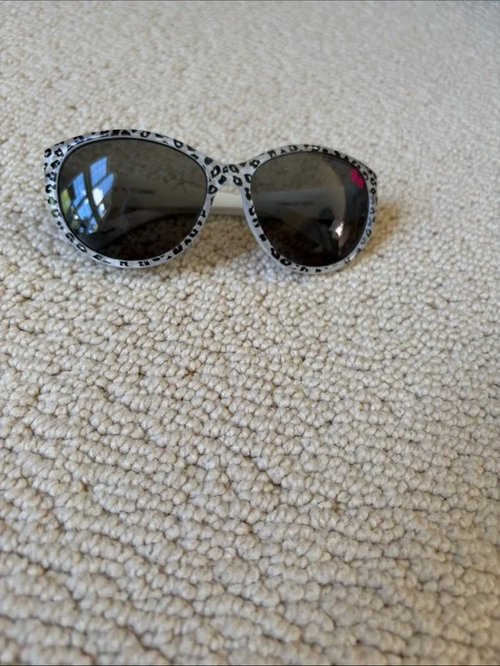Sanrio Kids Leopard Print Sunglasses with Black Lenses and Pink Bow Accent