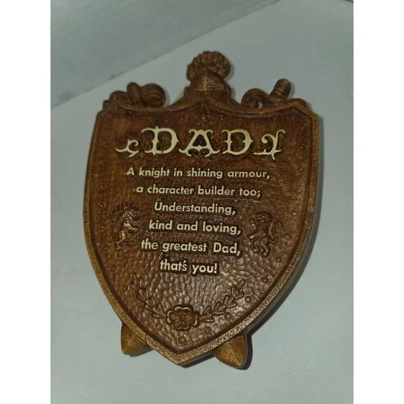 vintage faux wood composite shield-shaped wall plaque featuring a 