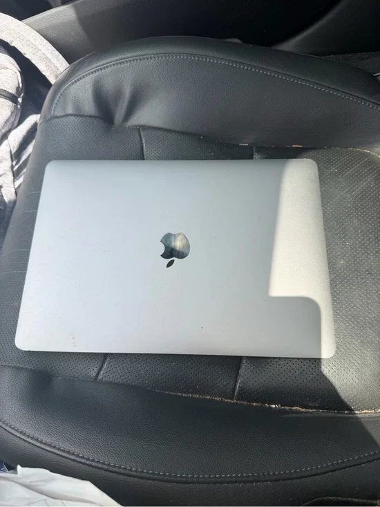 Apple Silver MacBook Laptop with Apple Logo