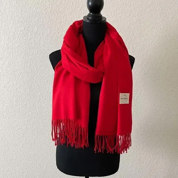 Soft warm scarf is a mixture of acrylic and cashmere condition is new