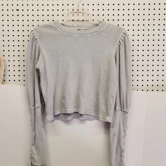 Free people waffle shirt women's size xs great condition.  Lace up long sleeves