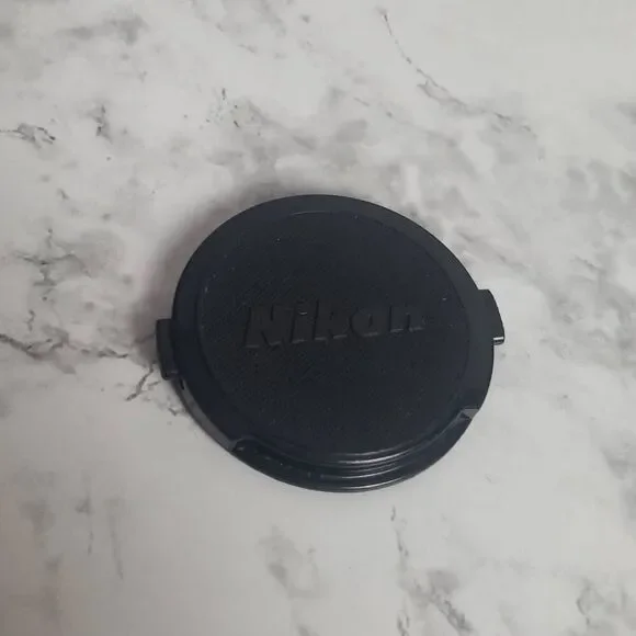 Nikon 52m.‎ Camera Cap
