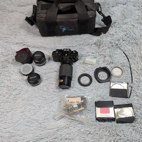 Vintage Nikon EM 35mm Film Camera Multi ‎ Lenses TriStar Filters Case Not Tested