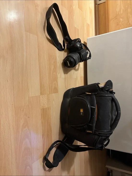 Nikon Black DSLR D3100 Camera with Black Camera Bag