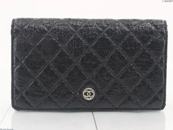 5909 - Chanel Matelasse Coco Button bi-fold wallet